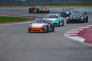 #7 Porsche 718 Cayman GT4 CLUBSPORT MR of Sam Owen and Sean Gibbons, NOLASPORT with OGH, Am, Pirelli GT4 America, SRO America, Circuit of the Americas, Austin, Texas, April May 2021. | SRO Motorsports Group