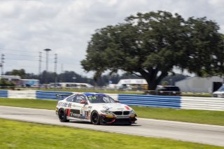 #82 BMW M4 GT4 of James Walker Jr. and Devin Jones, BimmerWorld, GT4 America, Pro-Am, SRO America, Sebring International Raceway, Sebring, FL, September 2022.
 | Brian Cleary/SRO