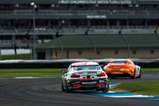 #82 BMW M4 GT4 of James Walker Jr. and Devin Jones, BimmerWorld, GT4 America, Pro-Am, SRO America, Indianapolis Motor Speedway, Indianapolis, Indiana, Oct 2022.
 | Fabian Lagunas/SRO        