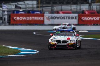 #82 BMW M4 GT4 of James Walker Jr. and Devin Jones, BimmerWorld, GT4 America, Pro-Am, SRO America, Indianapolis Motor Speedway, Indianapolis, Indiana, Oct 2022.
 | Fabian Lagunas/SRO        