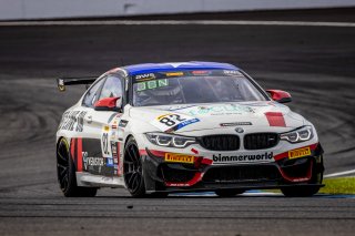 S#82 BMW M4 GT4 of James Walker Jr. and Devin Jones, BimmerWorld, GT4 America, Pro-Am, RO America, Indianapolis Motor Speedway, Indianapolis, Indiana, Oct 2022.
 | Regis Lefebure/SRO