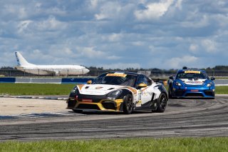 #18 Porsche 718 Cayman GT4 RS Clubsport of Roland Krainz and Austin Krainz, RS1, Pirelli GT4 America, Am, SRO America, Sebring International Raceway, Sebring, FL, September 2023.
 | Brian Cleary/SRO