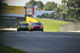 #82 BMW M4 GT4 (G82) EVO of James Walker Jr. and Tyler McQuarrie, BimmerWorld Racing, GT4 America, Pro-Am, SRO America, Road America, Elkhart Lake, WI, Aug 15 - 17, 2025 #23 Porsche 718 Cayman GT4 RS Clubsport of Michael Auriemma and Matheus Leist, NOLASP | Fred Hardy Jr. | www.FredHardyPhoto.com ©2025 