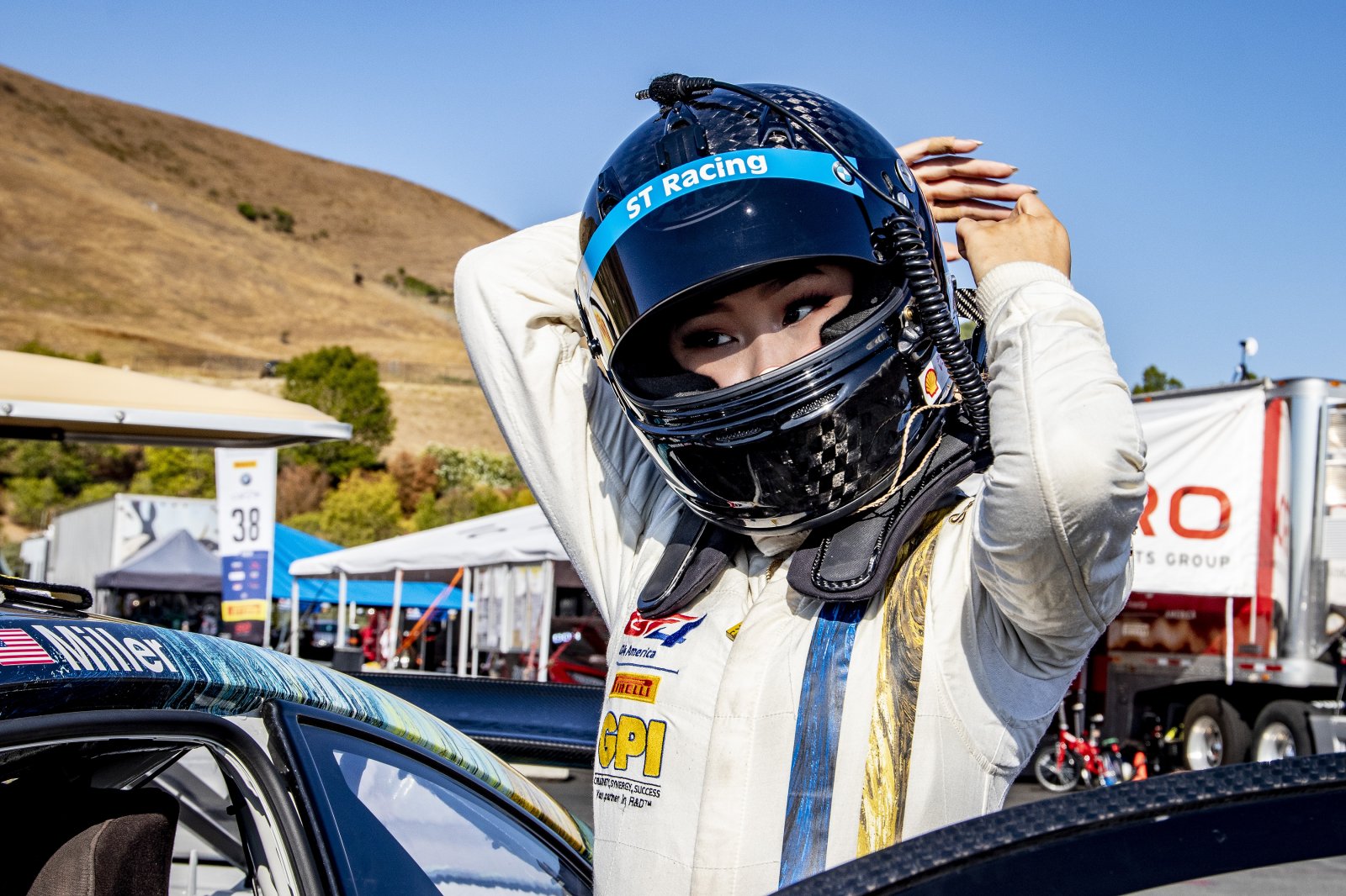 #38 BMW M4 GT4 of Samantha Tan and Jon Miller, ST Racing, GT4 SprintX, SRO America, Sonoma Raceway, Sonoma CA, Aug 2020.
