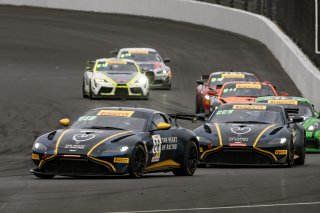 #26 Aston Martin Vantage AMR GT4 of Hannah Grisham and Riana O'Meara-Hunt, Heart of Racing Team, Pirelli GT4 America, Am, #24 Aston Martin Vantage AMR GT4 of Gray Newell and Roman De Angelis, SRO America, Indianapolis Motor Speedway, Indianapolis, IN, Oct | SRO Motorsports Group